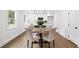 Elegant dining area with seating for four and easy access to the modern, updated kitchen at 1111 Edgefield Sw Dr, Atlanta, GA 30310