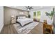 Relaxing primary bedroom suite showcasing a large window, neutral tones, and a spacious layout at 1111 Edgefield Sw Dr, Atlanta, GA 30310