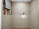 Utility room boasts modern water heater and new flooring at 1111 Edgefield Sw Dr, Atlanta, GA 30310