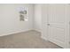 Cozy bedroom featuring soft carpet, neutral paint, and a window with blinds at 208 Oak View Ln, Dallas, GA 30157
