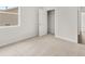 Bedroom with neutral carpet, bright natural light, closet, and hallway at 408 Oak View Ln, Dallas, GA 30157