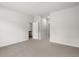 Large living room with neutral carpet, doors to multiple rooms at 408 Oak View Ln, Dallas, GA 30157