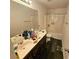 Bathroom featuring a dual sink vanity and shower at 4925 Locherby Dr, Fairburn, GA 30213