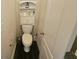 Bathroom features a toilet with a cabinet above it at 4925 Locherby Dr, Fairburn, GA 30213