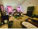 Carpeted bedroom with lots of contents and natural lighting at 4925 Locherby Dr, Fairburn, GA 30213