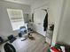 Cozy bedroom with a bright window and closet at 4925 Locherby Dr, Fairburn, GA 30213