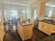 Kitchen and dining area with stainless steel appliances and wood floors at 4925 Locherby Dr, Fairburn, GA 30213