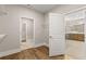 Spacious closet leads to the primary bathroom with walk-in shower at 1609 Tielman Way, Snellville, GA 30078