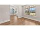 Bright living room with hardwood floors and large window with natural light at 1609 Tielman Way, Snellville, GA 30078