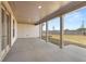 Covered patio overlooking spacious backyard, great for outdoor entertaining and relaxation at 1609 Tielman Way, Snellville, GA 30078