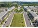 Expansive aerial view showcasing well-manicured lawns and abundant greenery in a meticulously planned community at 3 Hundley Ln, Roswell, GA 30076