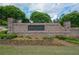 Welcome to Harlow West, a beautiful community, with a brick welcome wall and manicured landscaping at 3 Hundley Ln, Roswell, GA 30076