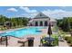 Beautiful community pool area with lounge chairs, tables and a charming clubhouse for residents enjoyment at 3 Hundley Ln, Roswell, GA 30076