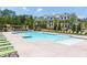 Resort-style pool with lounge chairs and a nearby clubhouse creates a relaxing atmosphere for community residents at 3 Hundley Ln, Roswell, GA 30076