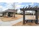 Inviting community space with covered picnic area and relaxing swing set, perfect for outdoor enjoyment at 3 Hundley Ln, Roswell, GA 30076