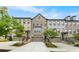 Attractive townhome exteriors with brick and well-manicured lawns offer appealing curb appeal at 3 Hundley Ln, Roswell, GA 30076