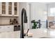 Modern matte black kitchen faucet and ample counter space in a bright kitchen at 3 Hundley Ln, Roswell, GA 30076