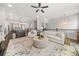 Open-concept living room showcases modern furnishings and seamless flow to kitchen at 3 Hundley Ln, Roswell, GA 30076