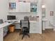 A functional office area with built-in shelves, desk space, and a convenient half bathroom at 3 Hundley Ln, Roswell, GA 30076
