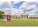 A bright view of Milton High School from the front lawn on a clear day with blue skies at 3 Hundley Ln, Roswell, GA 30076