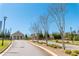 Street view showcasing Harlow Hall with meticulous landscaping, surrounded by a serene and well-maintained neighborhood at 3 Hundley Ln, Roswell, GA 30076