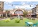 Community town center with regal cinemas, green space, fountains, and tables for gatherings at 3 Hundley Ln, Roswell, GA 30076