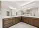 Modern bathroom featuring a long vanity with double sinks and cabinetry at 3772 Tielman St, Snellville, GA 30078