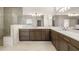 Modern bathroom featuring a long vanity with double sinks and cabinetry at 3772 Tielman St, Snellville, GA 30078