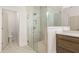 Beautiful bathroom featuring a glass shower and marble floors at 3772 Tielman St, Snellville, GA 30078