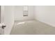 Bedroom with carpeted floors, natural lighting, and simple design at 3772 Tielman St, Snellville, GA 30078