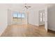 Bright bedroom with hardwood floors, a ceiling fan, and a large window with lots of natural light at 3772 Tielman St, Snellville, GA 30078