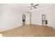 Bright bedroom with hardwood floors and an open doorway to another room at 3772 Tielman St, Snellville, GA 30078