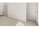 Bright bedroom features neutral carpet, freshly painted walls and trim and interior door to a closet at 3772 Tielman St, Snellville, GA 30078