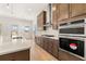 Modern kitchen featuring stainless steel appliances, a gas cooktop, and ample countertop space at 3772 Tielman St, Snellville, GA 30078
