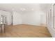 Bright and airy living room with hardwood floors, white walls, and large windows at 3772 Tielman St, Snellville, GA 30078