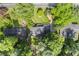 Aerial view of the property showcasing its roof and surrounded by lush greenery at 3824 N Cooper Lake Se Rd, Smyrna, GA 30082