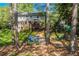 Backyard view complete with seating, a play set and swing, ready for fun and relaxation at 3824 N Cooper Lake Se Rd, Smyrna, GA 30082