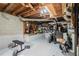 Unfinished basement area with work bench and work out equipment, ready for your personal touch at 3824 N Cooper Lake Se Rd, Smyrna, GA 30082