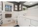Clean bathroom with white cabinets, tile flooring, and a shower-tub combination at 3824 N Cooper Lake Se Rd, Smyrna, GA 30082