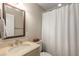 Bathroom with a vanity, mirror, and a shower with a white curtain at 6990 Brandon Mill Nw Rd, Atlanta, GA 30328