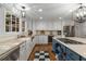 Well-lit kitchen with granite countertops, stainless steel appliances, and ample cabinet space at 6990 Brandon Mill Nw Rd, Atlanta, GA 30328