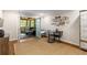 Transitional living area leading to an outdoor screened-in porch at 6990 Brandon Mill Nw Rd, Atlanta, GA 30328