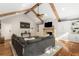 Spacious living room with vaulted ceiling, fireplace, and built-in shelving at 6990 Brandon Mill Nw Rd, Atlanta, GA 30328