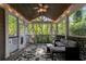 Cozy screened porch with hanging chairs and comfortable seating area at 6990 Brandon Mill Nw Rd, Atlanta, GA 30328