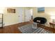 Inviting room featuring hardwood floors, eclectic furnishings, and ample natural light, creates a bright and cozy space at 6990 Brandon Mill Nw Rd, Atlanta, GA 30328