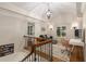 Bright upstairs landing with decorative touches, seating area, and natural light, perfect for work or relaxing at 6990 Brandon Mill Nw Rd, Atlanta, GA 30328