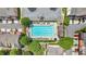 Top-down aerial view of a community swimming pool and lounge area, highlighting recreational amenities at 2281 Millhaven Se St # 18, Smyrna, GA 30080