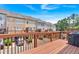 Inviting back deck showcasing outdoor living space and grilling area, perfect for relaxation and entertaining guests at 2281 Millhaven Se St # 18, Smyrna, GA 30080