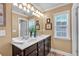 Bathroom with a double sink vanity, neutral colors, and good natural lighting at 2281 Millhaven Se St # 18, Smyrna, GA 30080