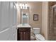 Cozy bathroom featuring a single sink vanity, 